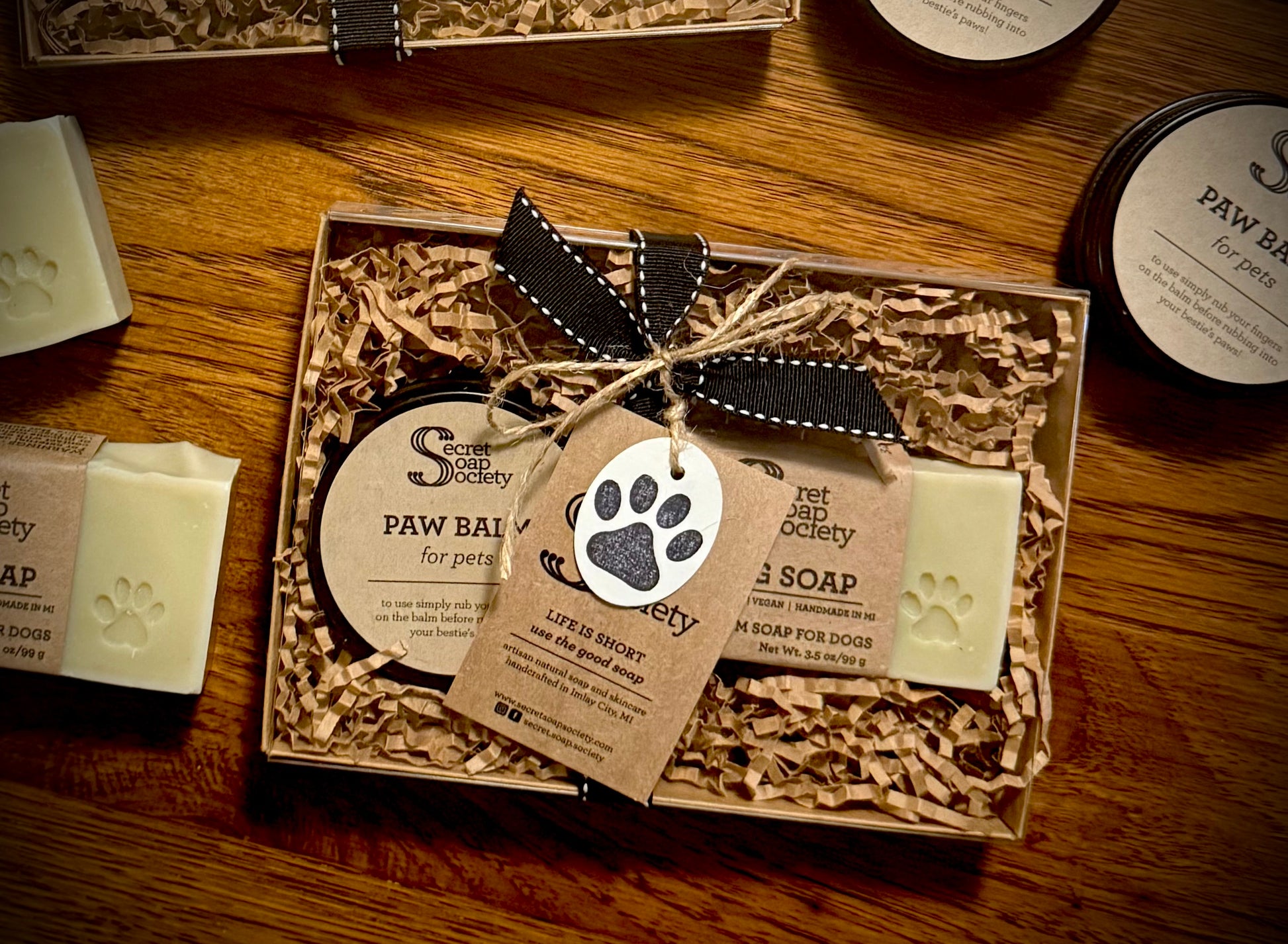 Dog care product set with paw balm, soap, in a box.